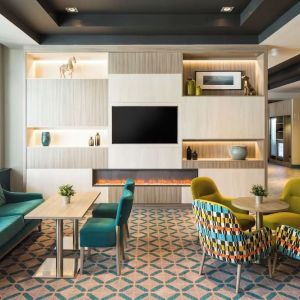 Lobby and coworking lounge at Leonardo Hotel Belfast.
