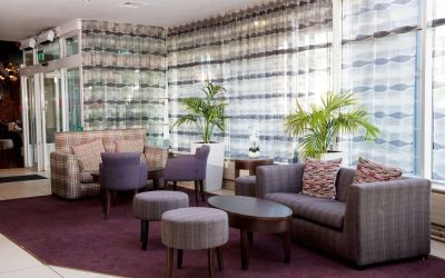 Lobby and coworking lounge at Leonardo Hotel Cork.
