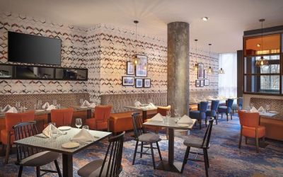 Dining area perfect for coworking at Leonardo Hotel Exeter.