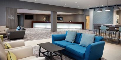 Lobby and coworking lounge at Leonardo Royal Hotel Oxford.