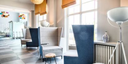 Lobby and coworking lounge at Leonardo Royal Hotel Edinburgh Haymarket. 
