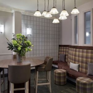 Lobby and coworking lounge at Leonardo Hotel Edinburgh City.
