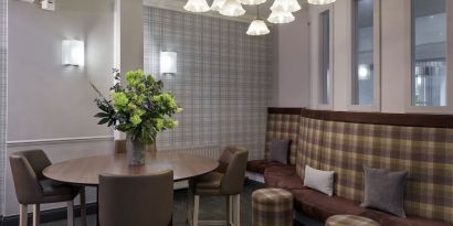 Lobby and coworking lounge at Leonardo Hotel Edinburgh City.