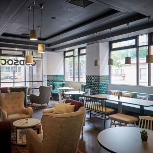 Lobby and coworking lounge at Leonardo Hotel Manchester Central.