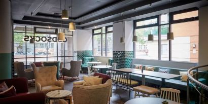 Lobby and coworking lounge at Leonardo Hotel Manchester Central.