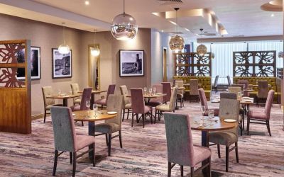 Dining area perfect for coworking at Leonardo Hotel Milton Keynes.