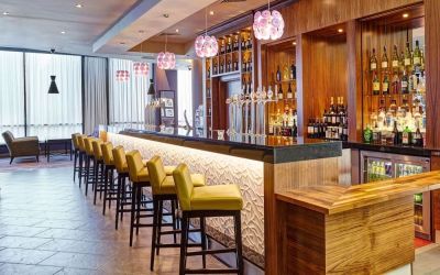 Lobby and coworking lounge at Leonardo Hotel Milton Keynes.