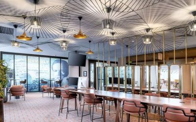 Lobby and coworking lounge at Hilton Garden Inn London Heathrow Airport.