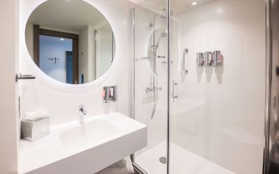 Guest bathroom with shower at Hampton By Hilton Blackpool.