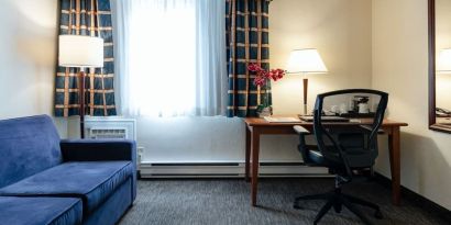 Work station and lounge in day use room at Travelodge Ottawa East.