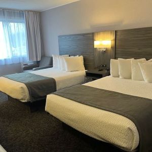 Double bed day use room with workstation at Travelodge Ottawa East.