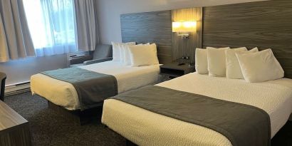 Double bed day use room with workstation at Travelodge Ottawa East.