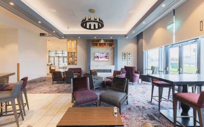 Lobby and coworking lounge at Hilton Garden Inn Birmingham Airport.