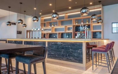 Lobby and coworking lounge at Hilton Garden Inn Birmingham Airport.