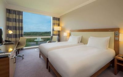 Double bed day use room with work desk and TV at the Hilton Reading.