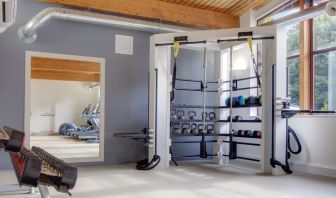 Fitness center with treadmills, machines and equipment at Hilton London Watford.