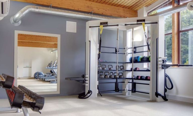 Fitness center with treadmills, machines and equipment at Hilton London Watford.
