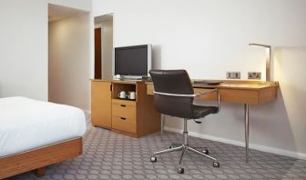 Day use room with TV and comfortable work desk at Hilton London Watford.