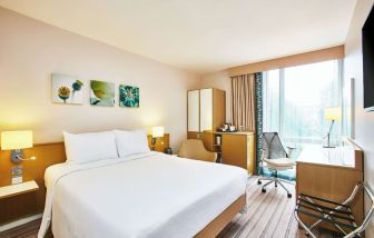Bright hotel room with working station at the Hilton Garden Inn Birmingham Brindleyplace.