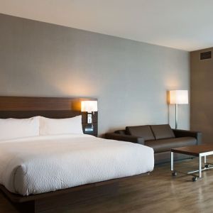 Spacious day use room with natural light at AC Hotel Cincinnati At Liberty Center.