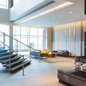 Lobby and coworking lounge at AC Hotel Cincinnati At Liberty Center.