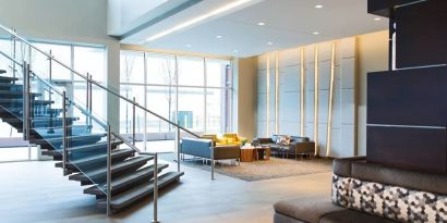 Lobby and coworking lounge at AC Hotel Cincinnati At Liberty Center.