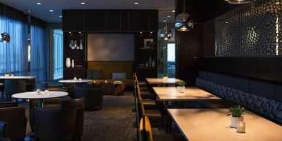 Dining area perfect for coworking at AC Hotel Cincinnati At Liberty Center.