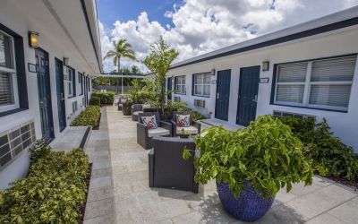Relaxing outdoor terrace at Hollywood Beach Suites, A South Beach Group Hotel.