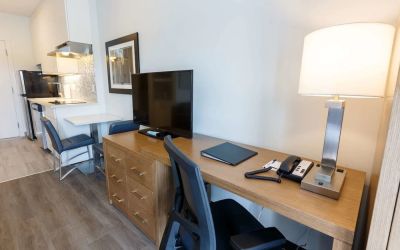 Day use guest room with work desk and in-door kitchen at Executive Residency By Best Western.