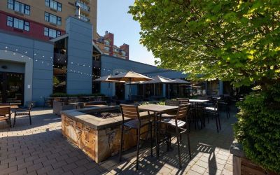 Outdoor bar with lounge area, perfect for co-working at Hilton Whistler Resort & Spa.