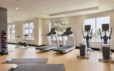 Fully equipped fitness center at the Embassy Suites by Hilton Montreal Airport.