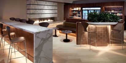 Hotel lounge with fireplace at DoubleTree By Hilton Montreal.