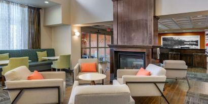 Comfortable hotel lobby perfect for co-working at Hampton Inn & Suites By Hilton Edmonton/West.