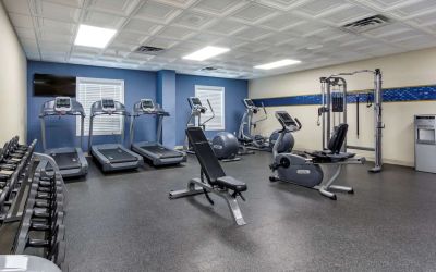 Fully equipped fitness center at Hampton Inn & Suites By Hilton Edmonton/West.