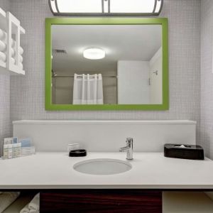 Private bathroom with free toiletries at the  Hampton Inn & Suites By Hilton Guelph.