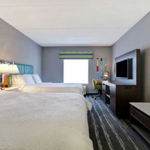 Day use twin room with TV, work desk and private bathroom at the  Hampton Inn & Suites By Hilton Guelph.