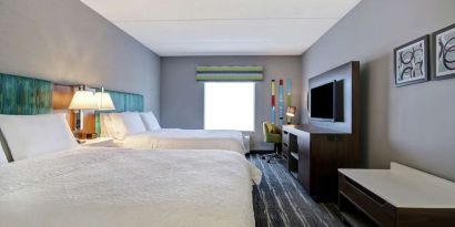 Day use twin room with TV, work desk and private bathroom at the  Hampton Inn & Suites By Hilton Guelph.