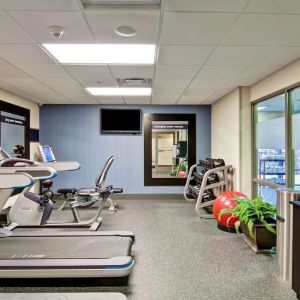 Fully equipped fitness center at the  Hampton Inn & Suites By Hilton Guelph.