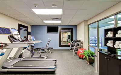 Fully equipped fitness center at the  Hampton Inn & Suites By Hilton Guelph.