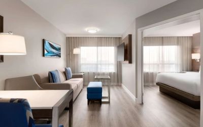 Day use studio suite with living room and work station at the Embassy Suites By Hilton Toronto Airport.