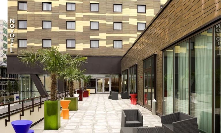 Spacious balcony with seats at Novotel London Paddington.

