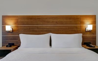 King bed at Holiday Inn Express Kingston West.