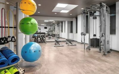 Fully equipped fitness center at Courtyard By Marriott Edmonton Downtown.