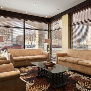 Hotel lobby with comfortable seating at Days Inn Edmonton Downtown.