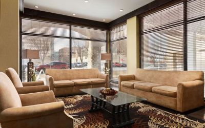 Hotel lobby with comfortable seating at Days Inn Edmonton Downtown.