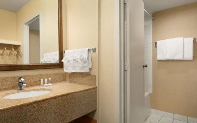 Private guest bathroom at Days Inn Edmonton Downtown.