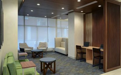 Lobby lounge with workspace at Holiday Inn Express Toronto Downtown.