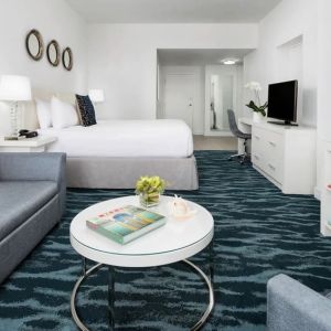 Day use room with sofa and work desk at YVE Hotel Miami.