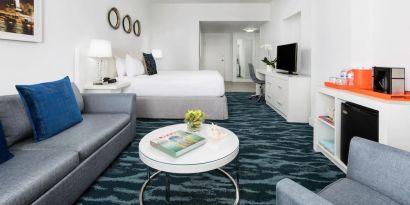 Day use room with sofa and work desk at YVE Hotel Miami.