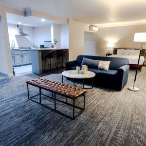 Day use room with sofa and kitchen at The Live Hotel.